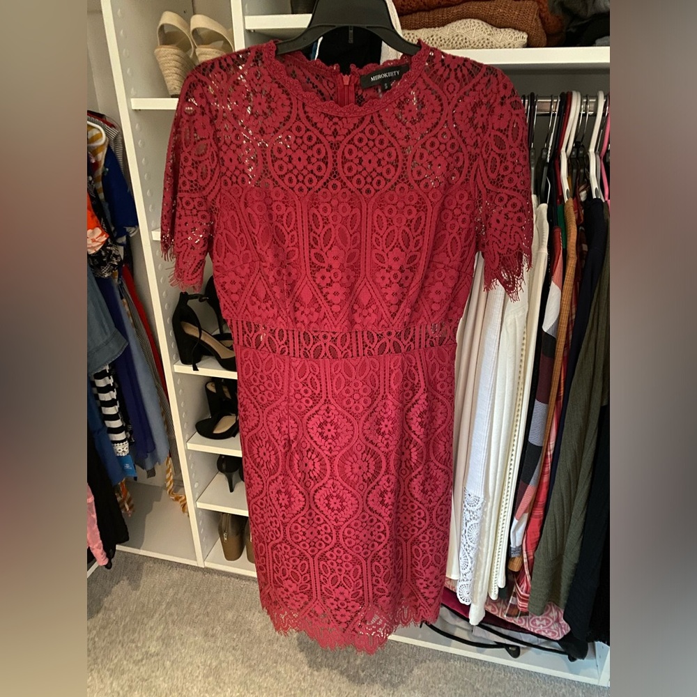 Dark red dress with mid section cutouts